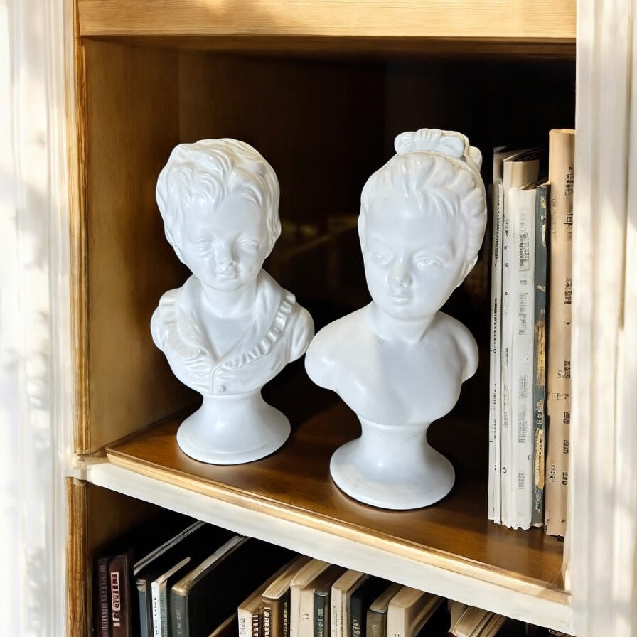 Pair of White Glazed Ceramic Busts