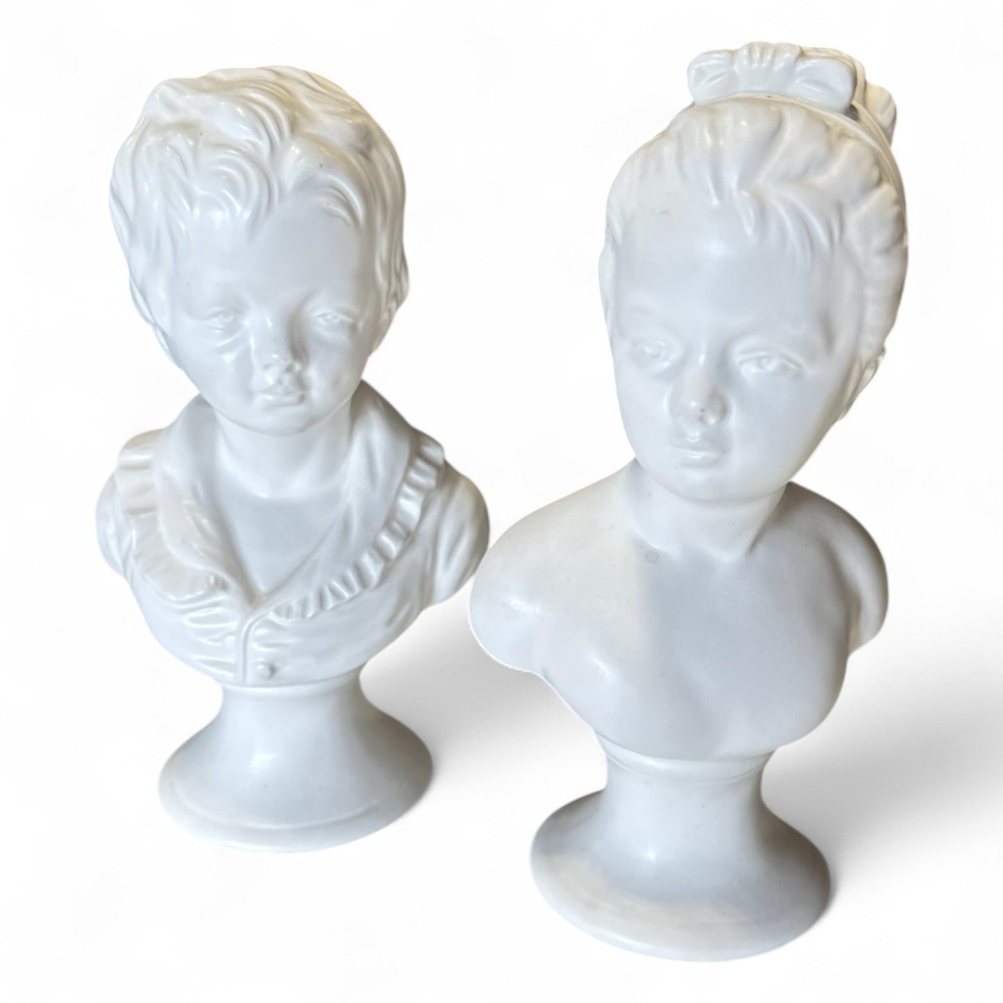 Pair of White Glazed Ceramic Busts