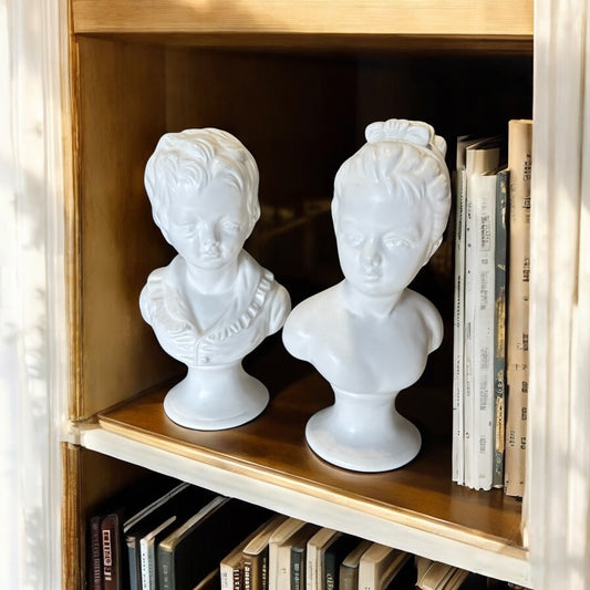 Pair of White Glazed Ceramic Busts